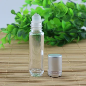 10 ml de vidrio transparente botella con ( bolas de acero ) roll on para los ojos, crema,perfume,aceite esencial,desodorante botella de embalaje de cosméticos