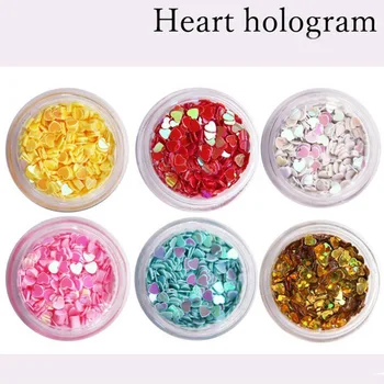12 Colores Caja De Clavos De Accesorios De Diseño Para El Arte De Uñas Decoración De Pedrería De Piezas Para La Manicura De La Joyería Del Corazón Del Holograma En Polvo