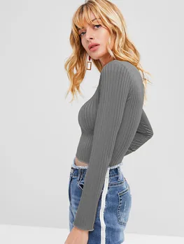 La moda del color sólido blanco y negro y suéter de primavera 2021 de manga larga jersey de cuello alto de las mujeres slim-fit suéter con vientre
