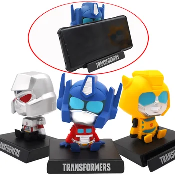 Robot juguetes de Transformers Bumblebee, Optimus Prime, Megatron sacudir la cabeza de la muñeca de Escritorio de coches de base de telefonía Móvil, auto adornos de decoración